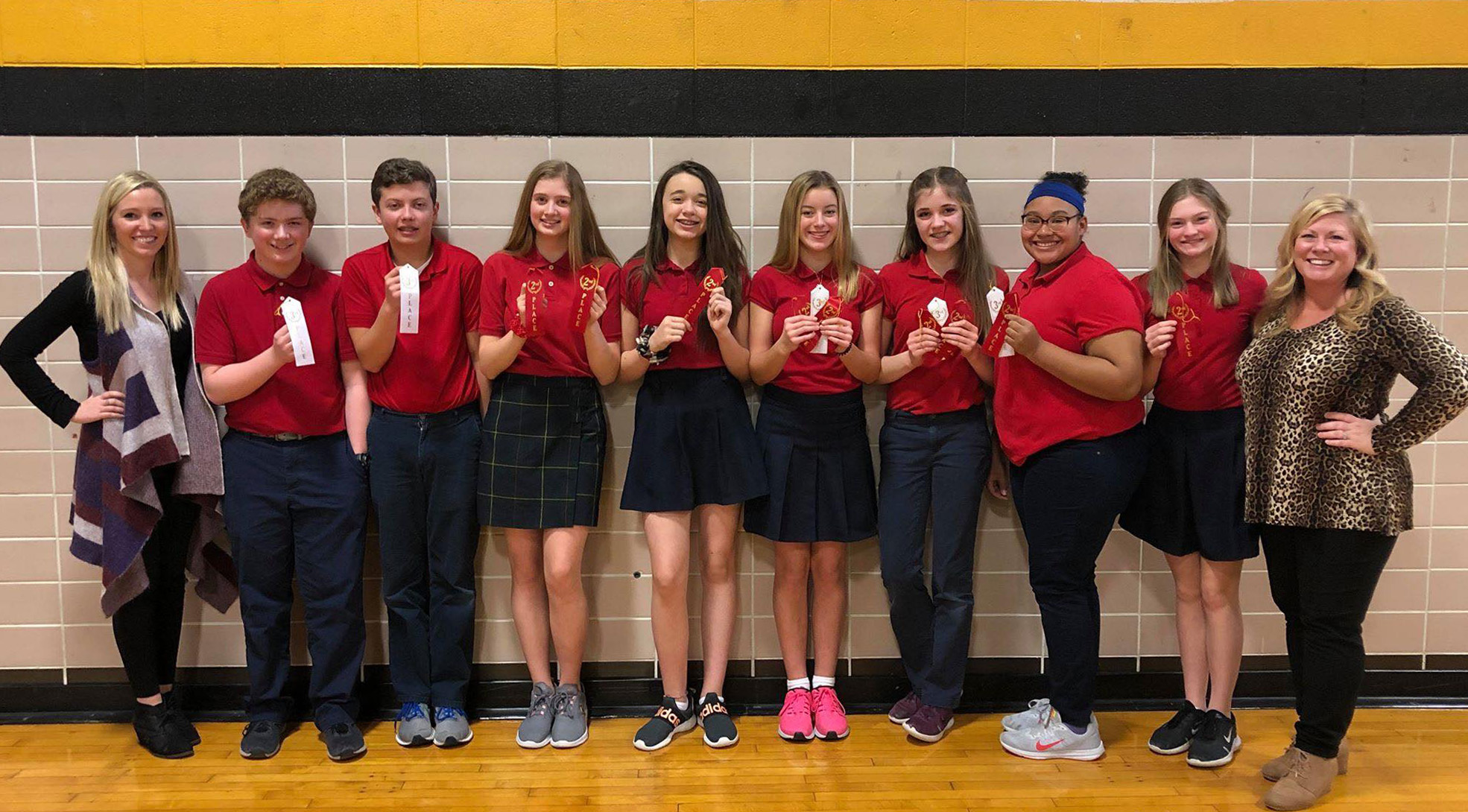 students with their awards ribbons after a math competition